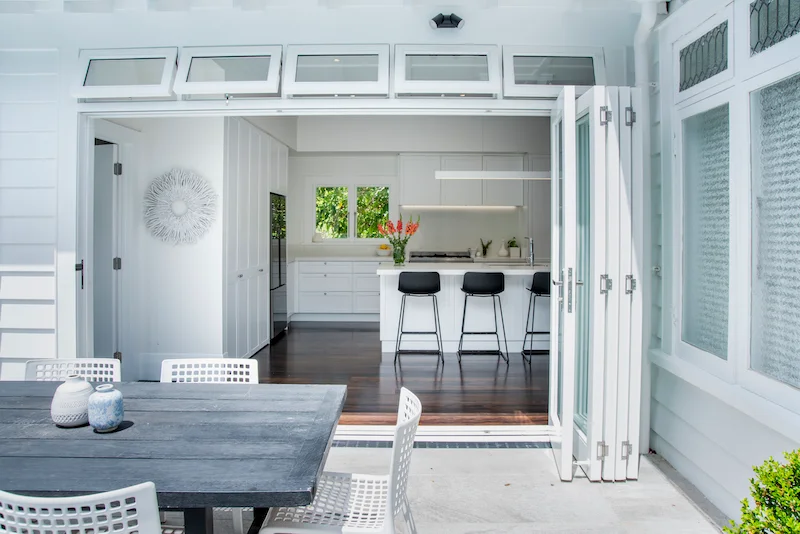 Kitchen folding door by Qualitas Builders in Auckland