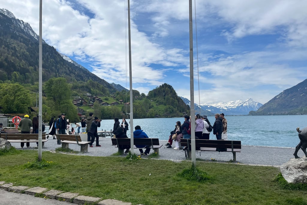 Crowds taking pictures in Iseltwald Switzerland