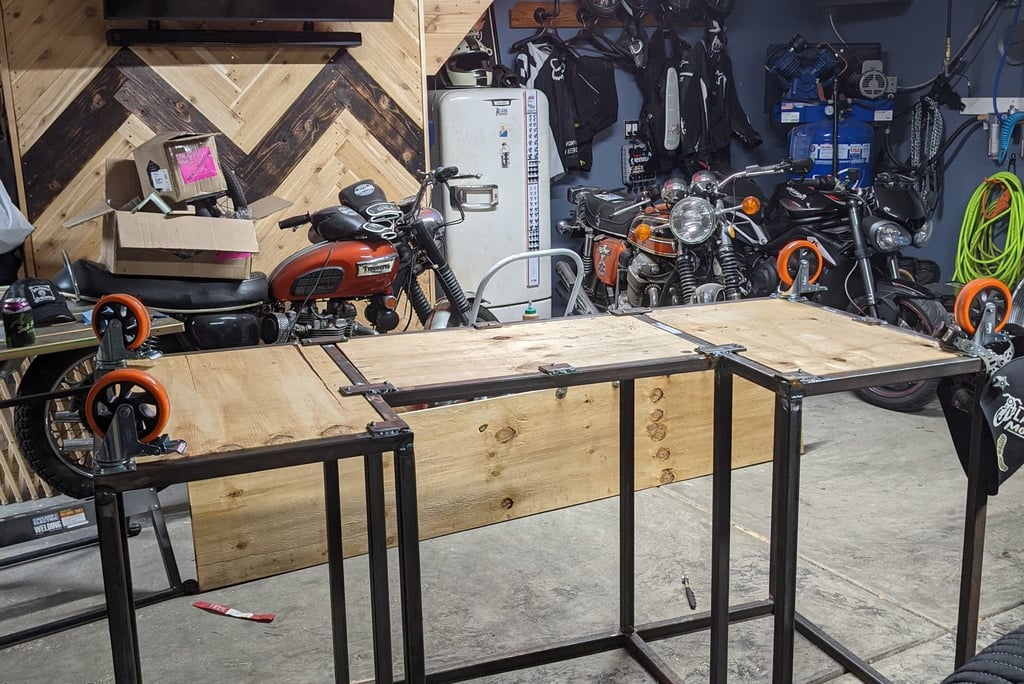 2021 - Adding wheels to the frame of the bar I welded together.