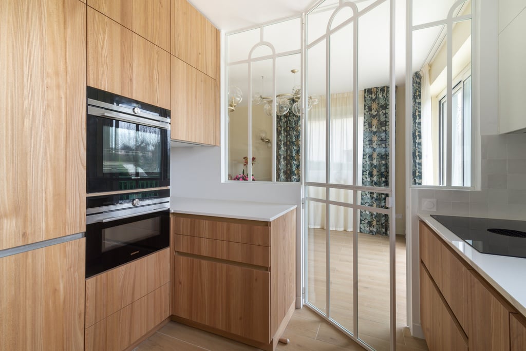 a kitchen with a stove top oven and a microwave
