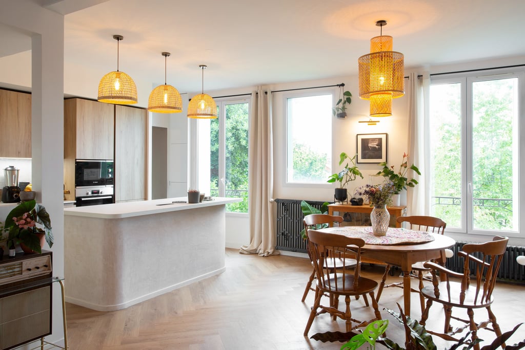 a kitchen with a table and chairs and a kitchen