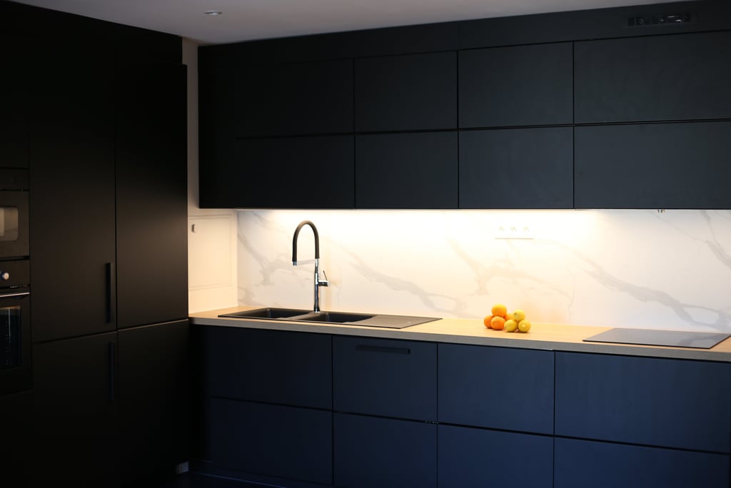 a kitchen with a sink and a counter top