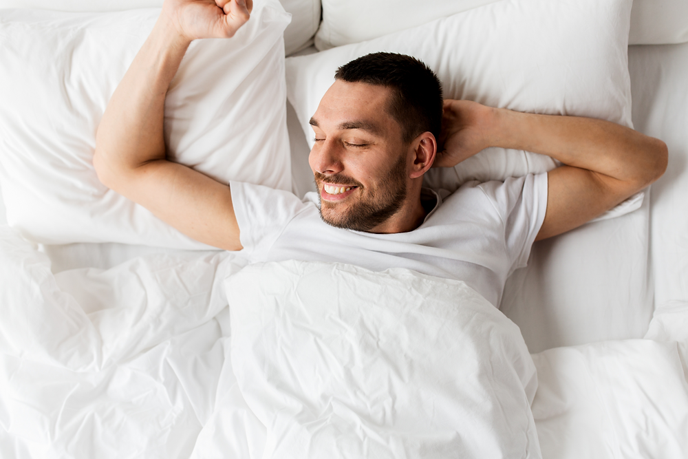 Man sleeping after using a top massage gun