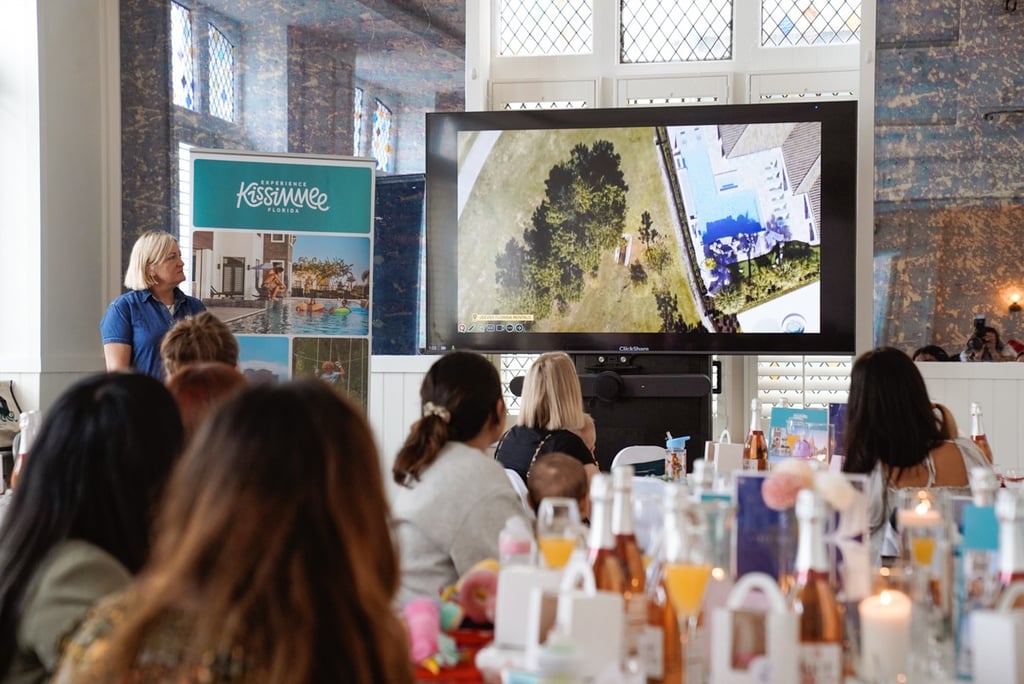 people looking at the tv during an event