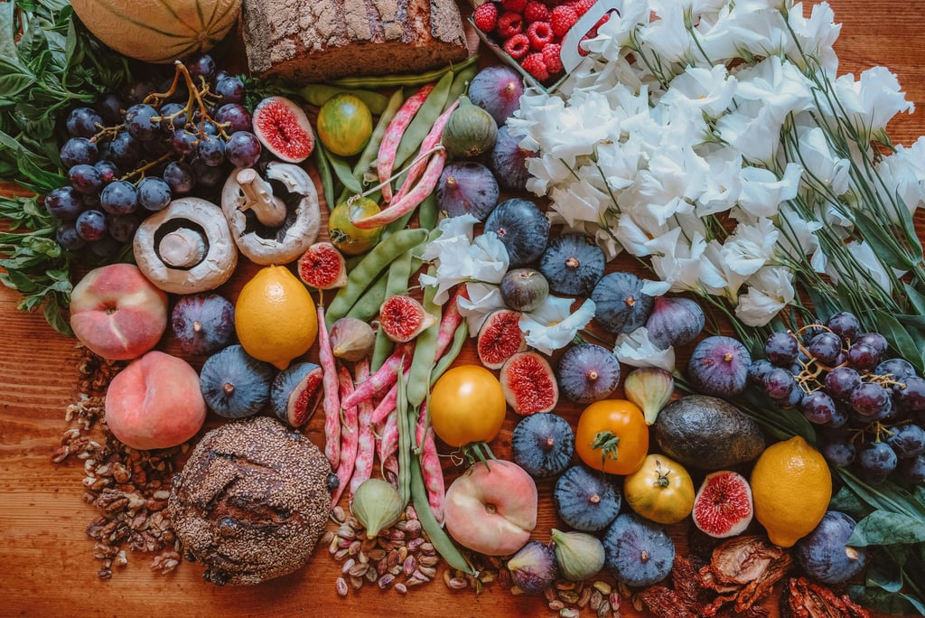 a bunch of colorful fruits and vegetables on a table