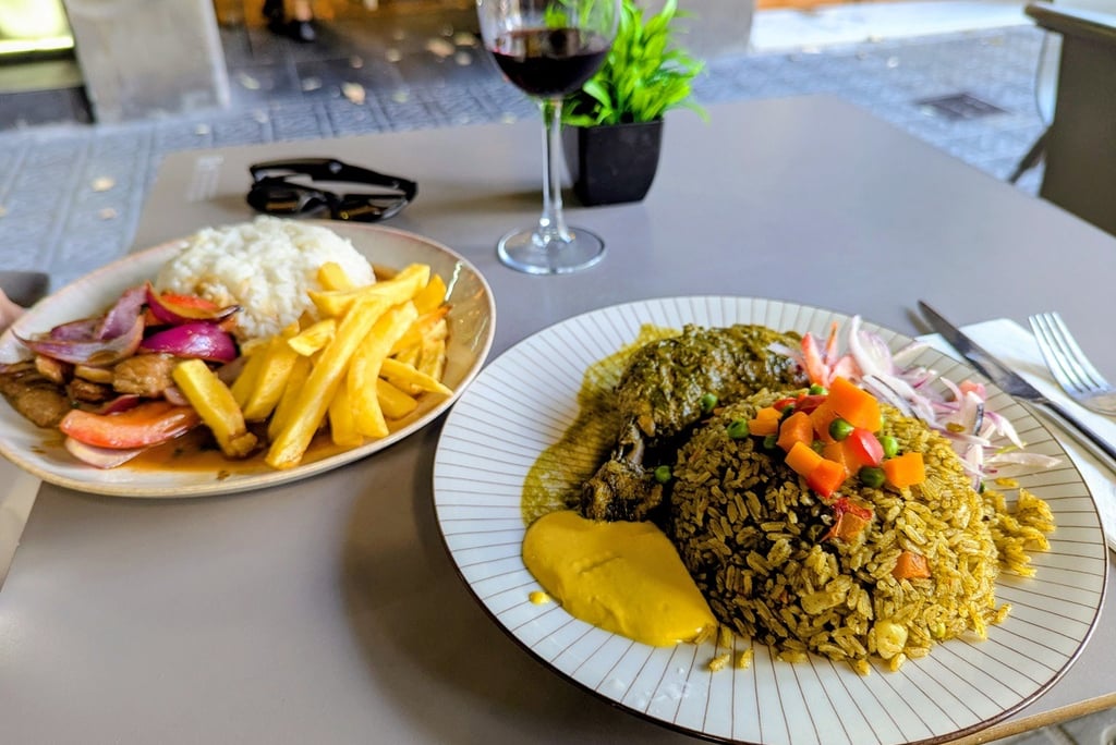 Pollo con arroz y huancaina + Lomo Saltado at Cumpanama Peruvian Restaurant