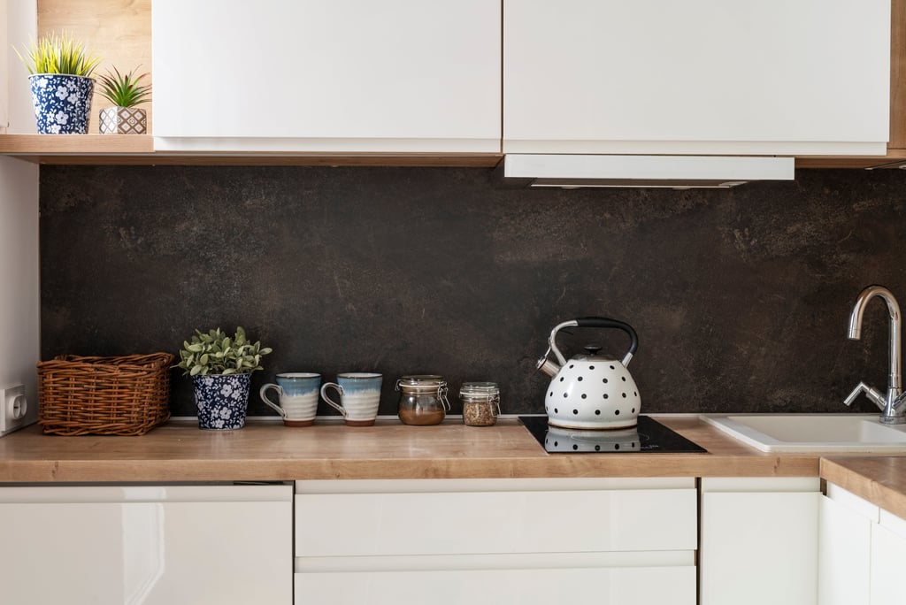 a kitchen with a kettle kettle kettler and a tea kettle