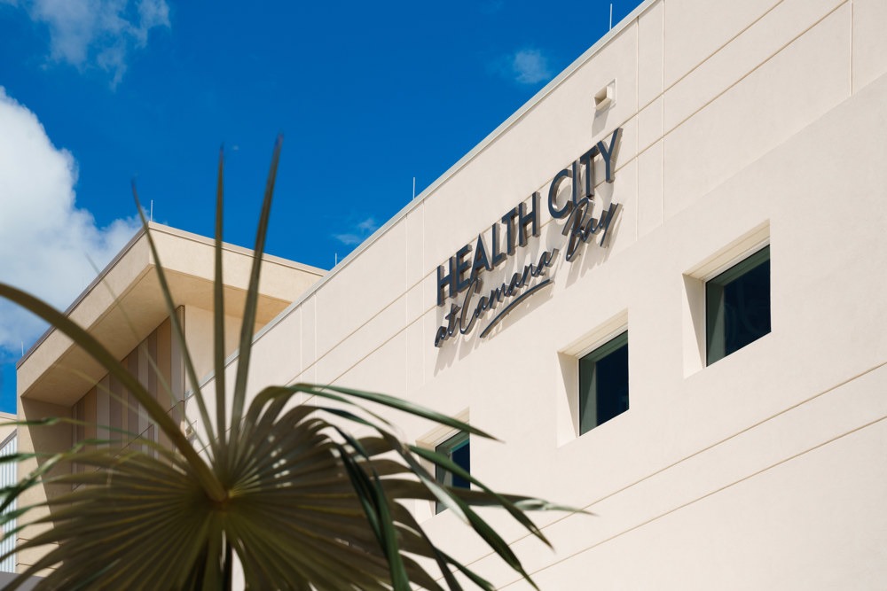 Health City Hospital, Cayman—modern state-of-the-art medical facility exterior with adv achitecture
