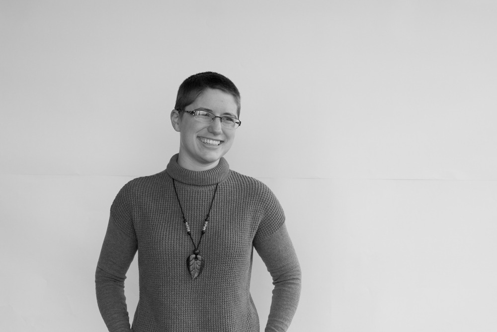 Photo of Melody smiling with an open posture