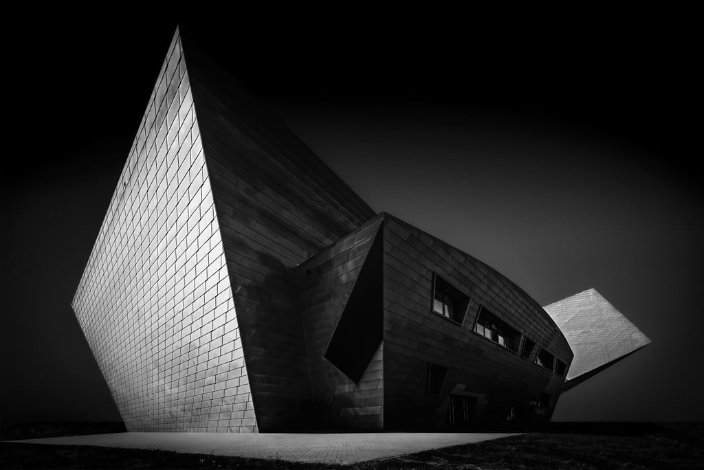 Fine art architecture photograph "Lithos" by Anna Wacker — monumental angular museum facade in black and white