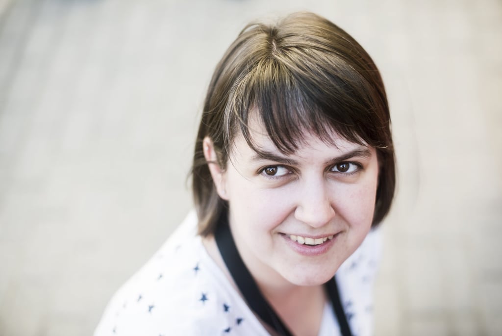 a woman with a tie around her neck