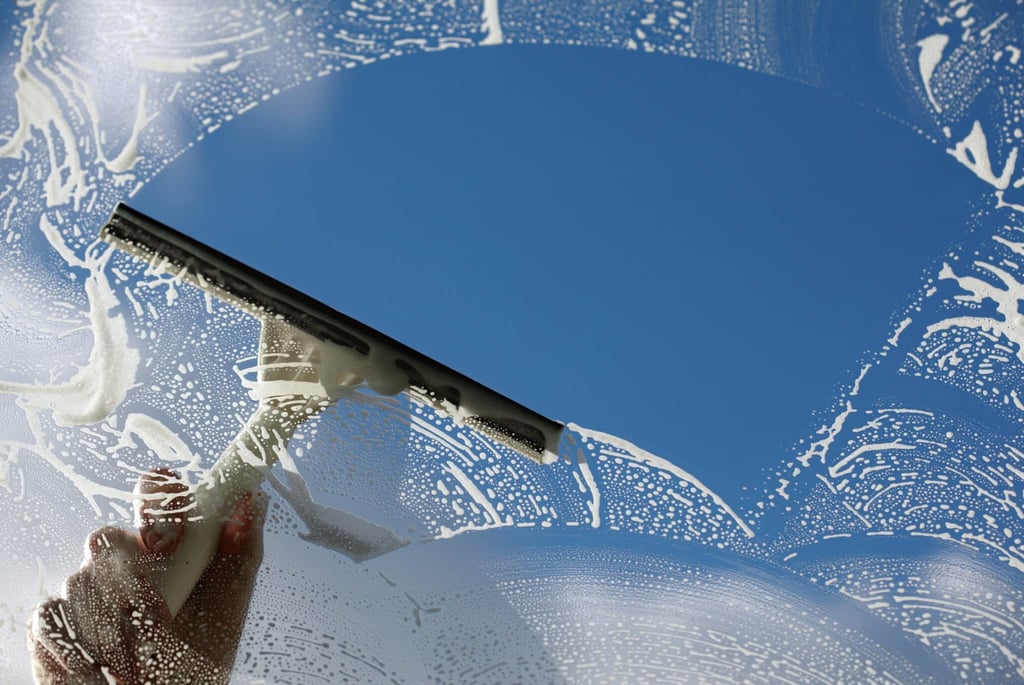Professional window cleaning in San Antonio, Texas, ensuring spotless and clear views