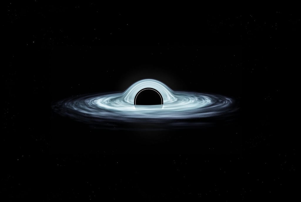 Black Holes and Wormholes: Are They Gateways to Other Universes?