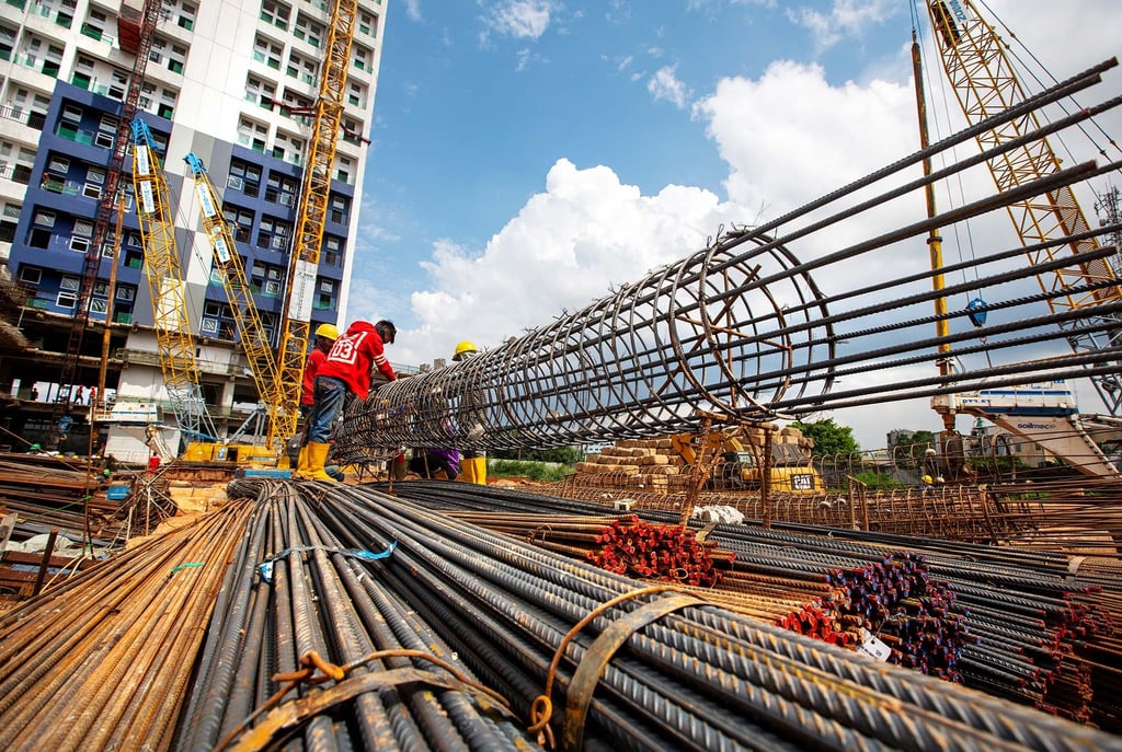 jasa photography annual report, jakarta. a construction worker on a construction site in a city
