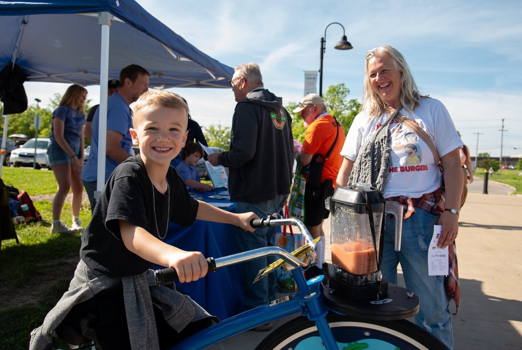 Young boy on our blender bike powering a smoothie!