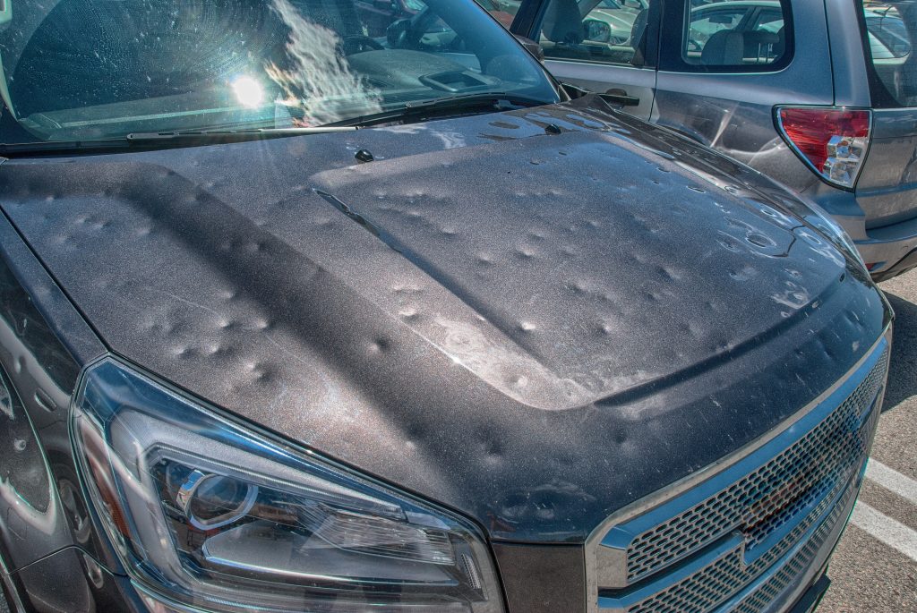 PDR efficiently repairs hail damage by gently pushing dents out without repainting.