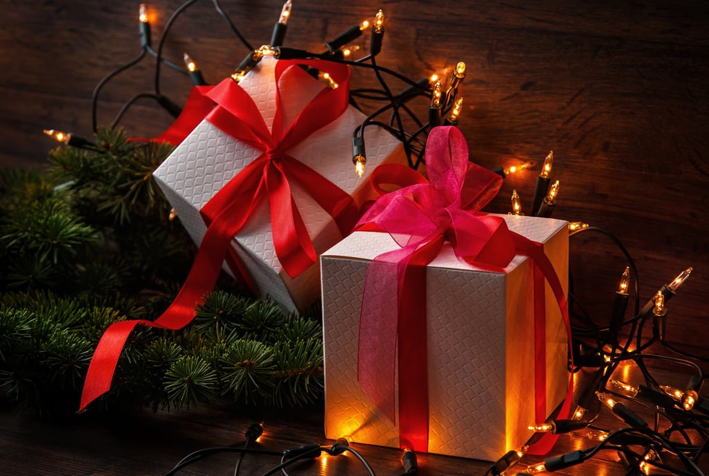 Christmas background with gift boxes and lights