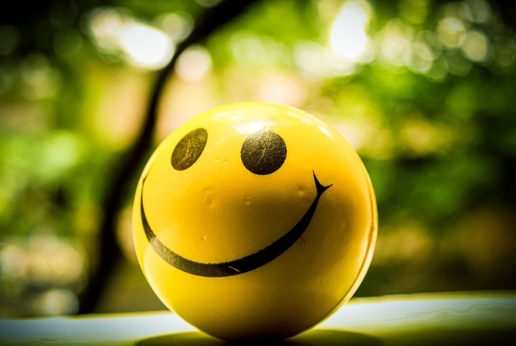 a yellow ball with a smiley face