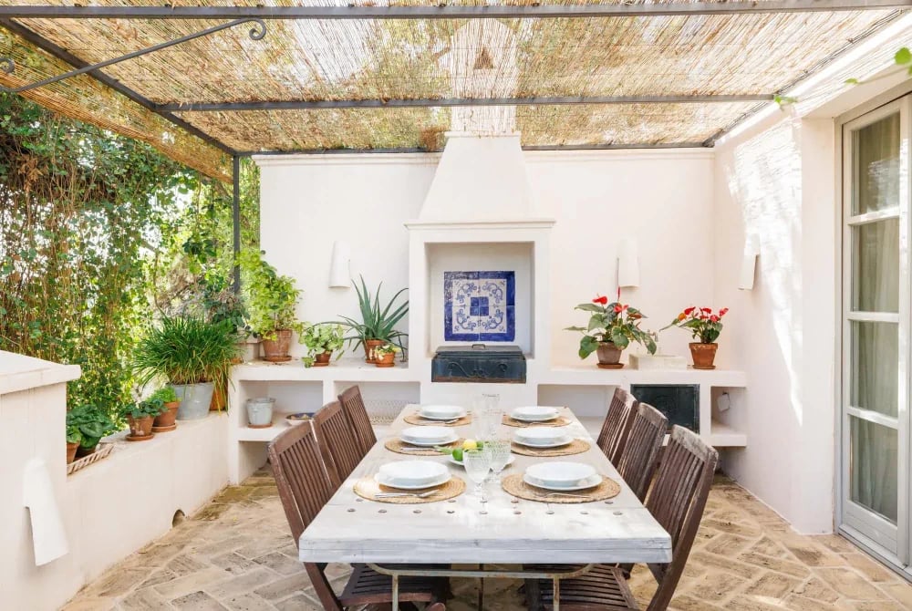 Shaded outdoor dining patio at Finca Santa Katerina