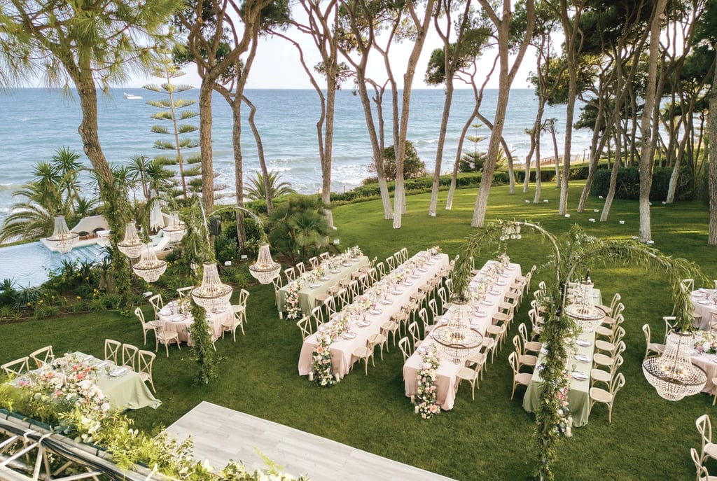 Aerial view of beachfront gala dinner setup in Marbella