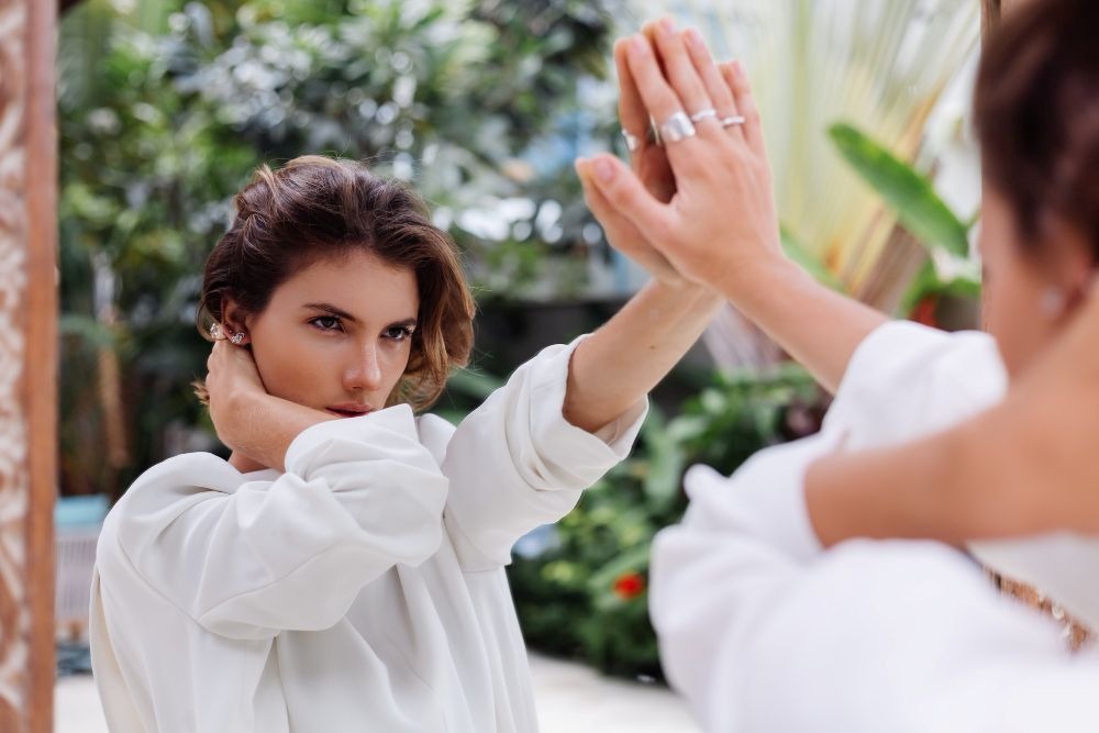 a woman in a white shirt saying no