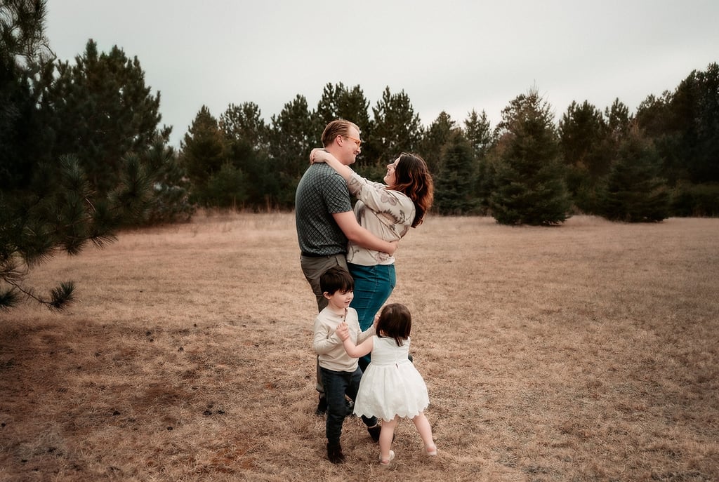 Duluth Family Photo in a field on a cloudy day