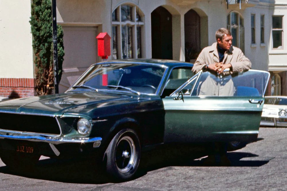 steve mcqueen and his iconic green bullitt ford mustang