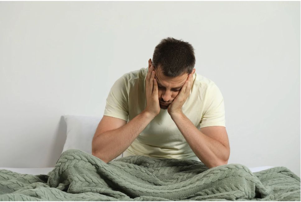 Man in Hassocks feeling low energy and fatigued at home
