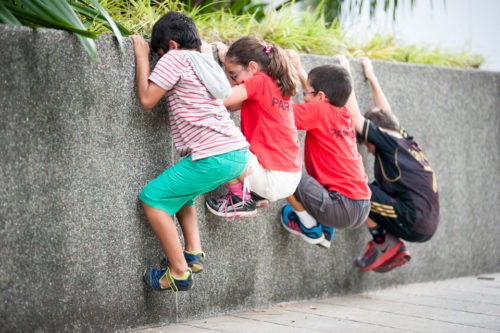 Kids playing parkour outdoors
