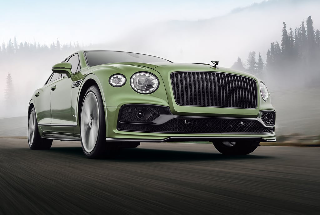 a green bentley rolling shot