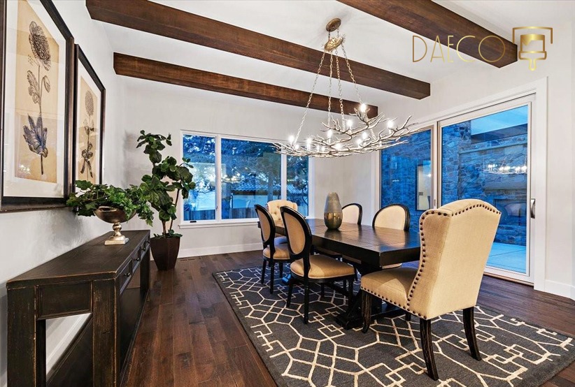 a dining room with a table and chairs