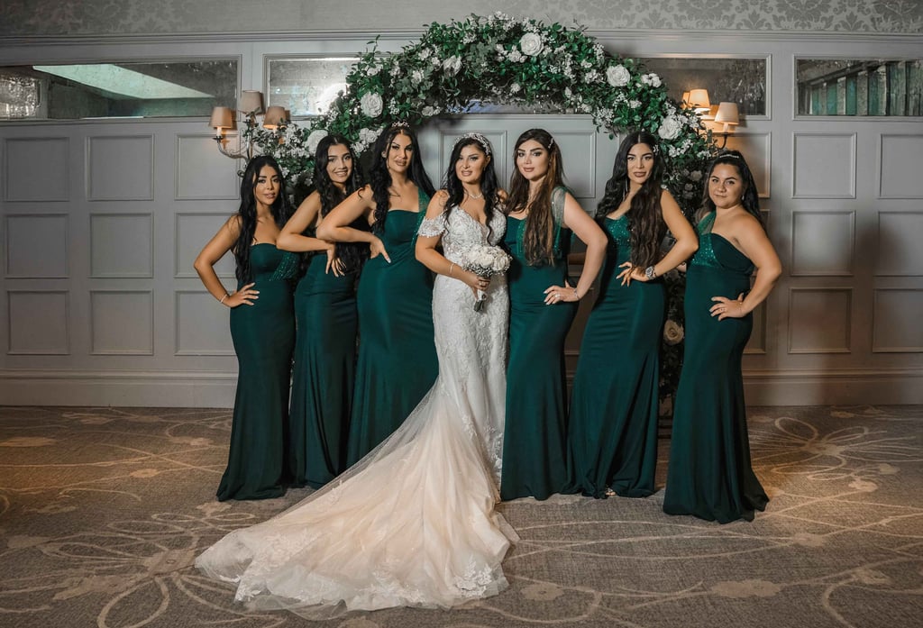 Bride with bridesmaids in green dresses, shot by Fred Art Studio