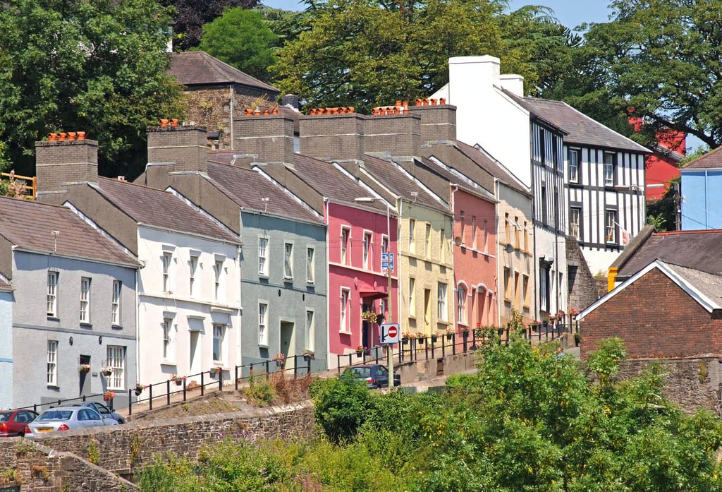 The colourful houses on Llandeilo main street as it climbs the hill