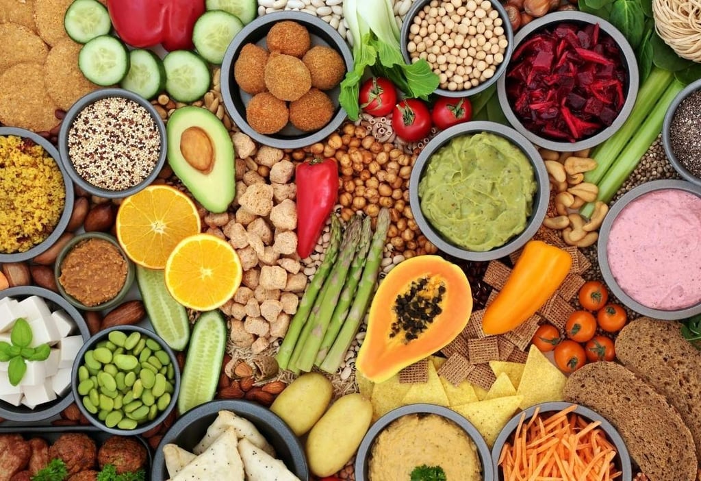vegan food on table. fruits, vegetables, legumes, nuts