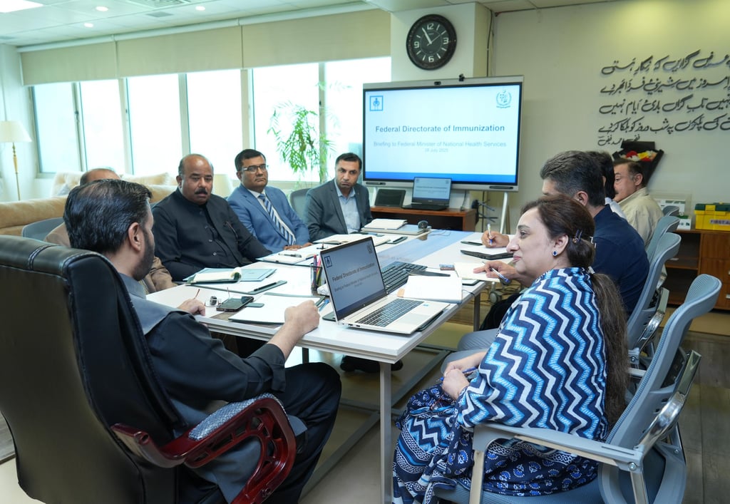 Federal Health Minister Syed Mustafa Kamal chairing Federal Directorate of Immunization meeting