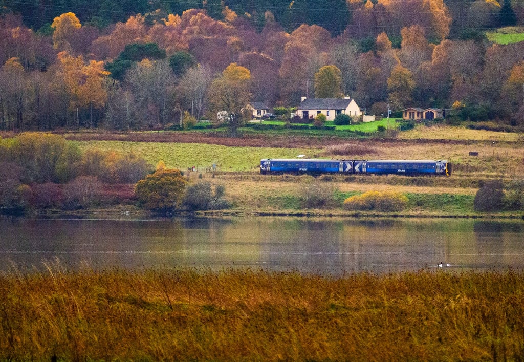 ScotRail Train leaving Ardgay for Inverness Scotland UK