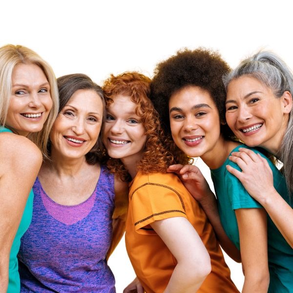a group of women who are all smiling and posing for a picture