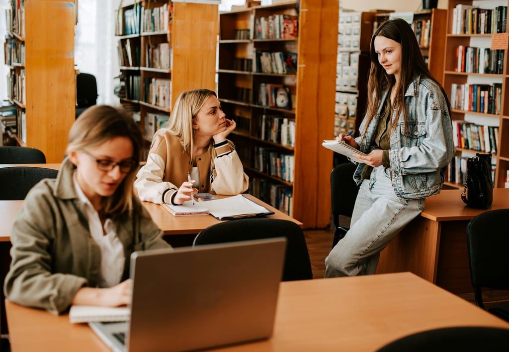 A Level Maths Online Tutoring students in a library with the right A Level mathematics resources