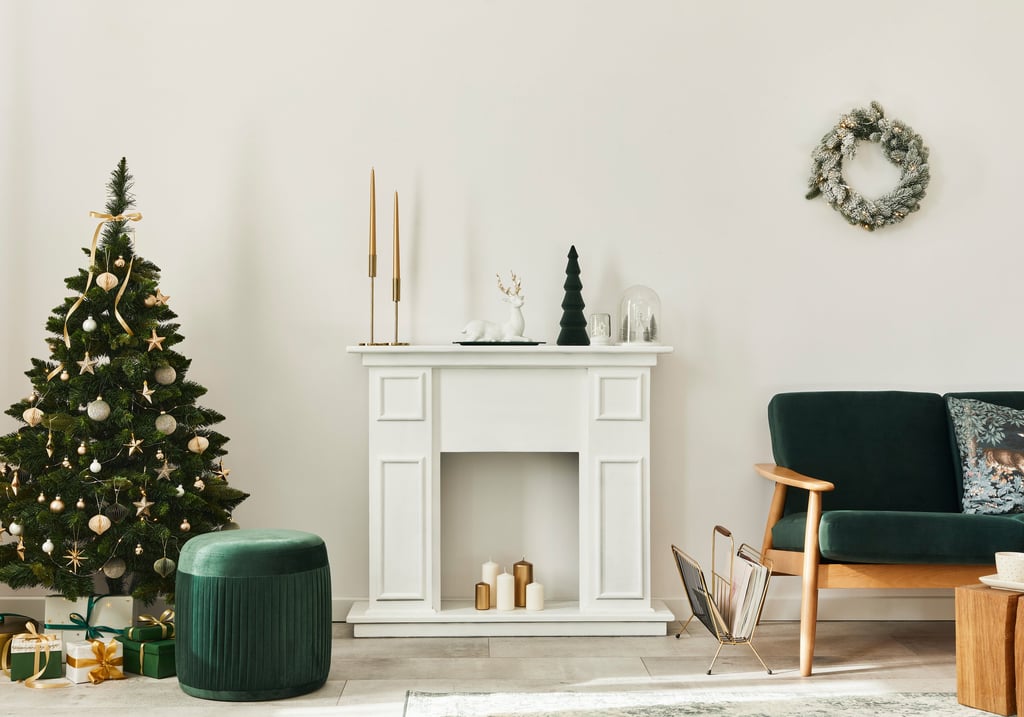a living room with a christmas tree and a christmas tree