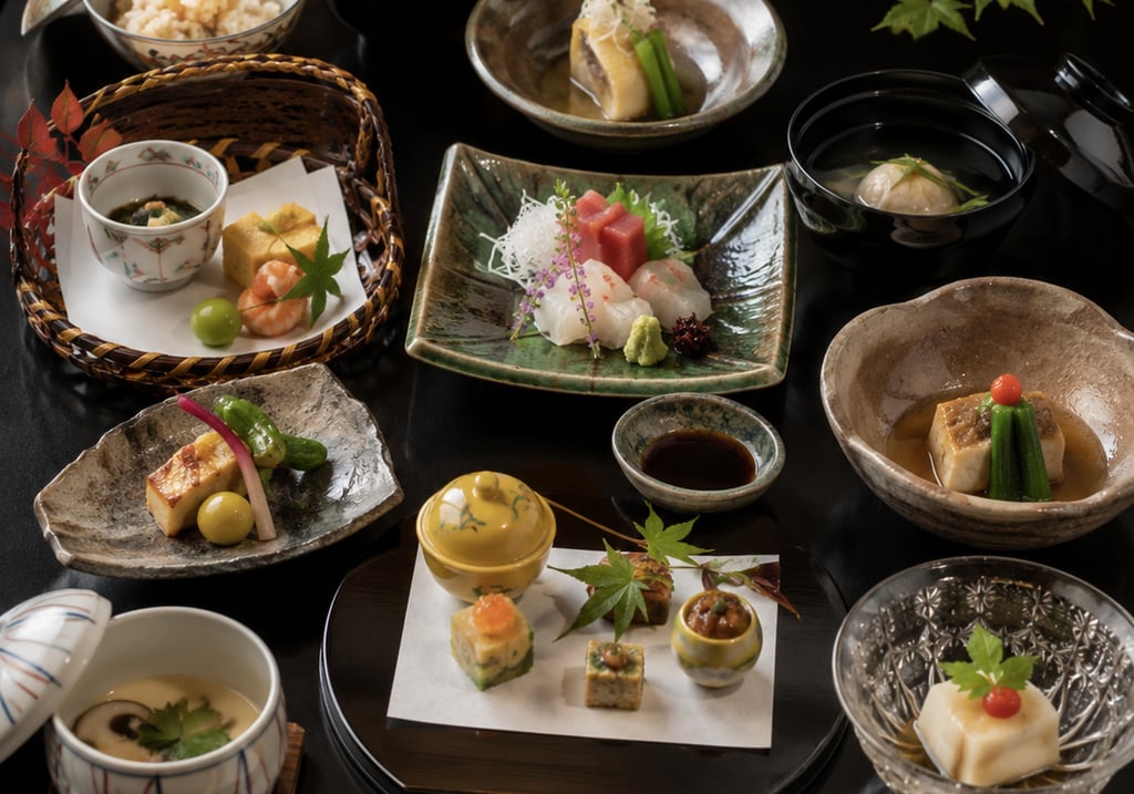 Traditional Japanese kaiseki meal set with sashimi, miso soup, and small seasonal dishes on a dark table.