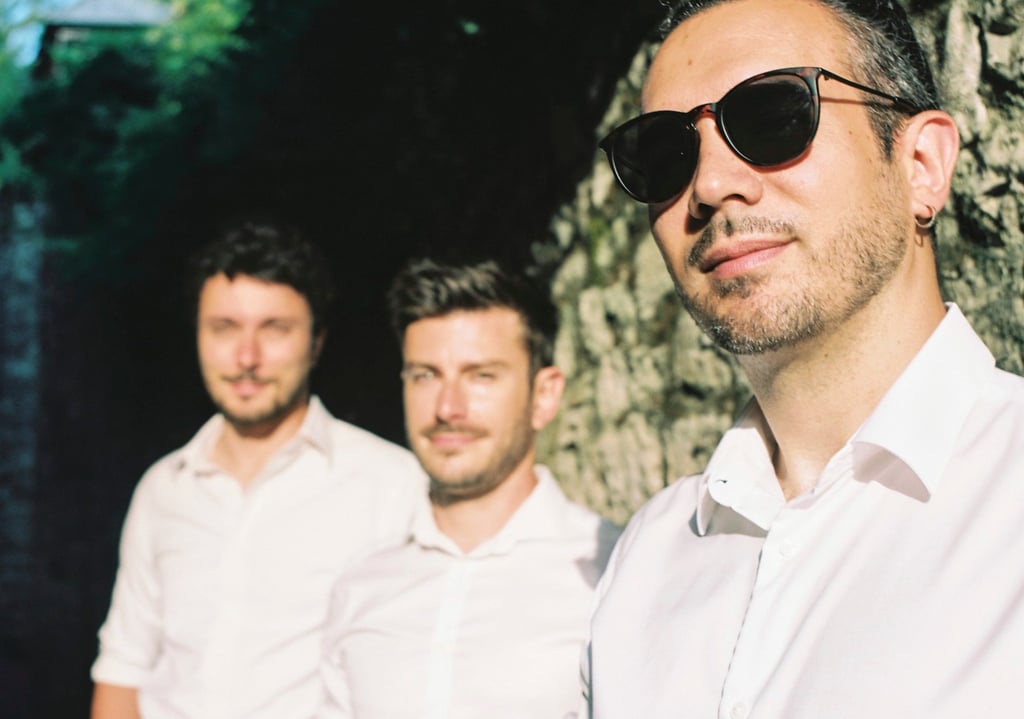 Professional wedding musicians performing outdoors in France