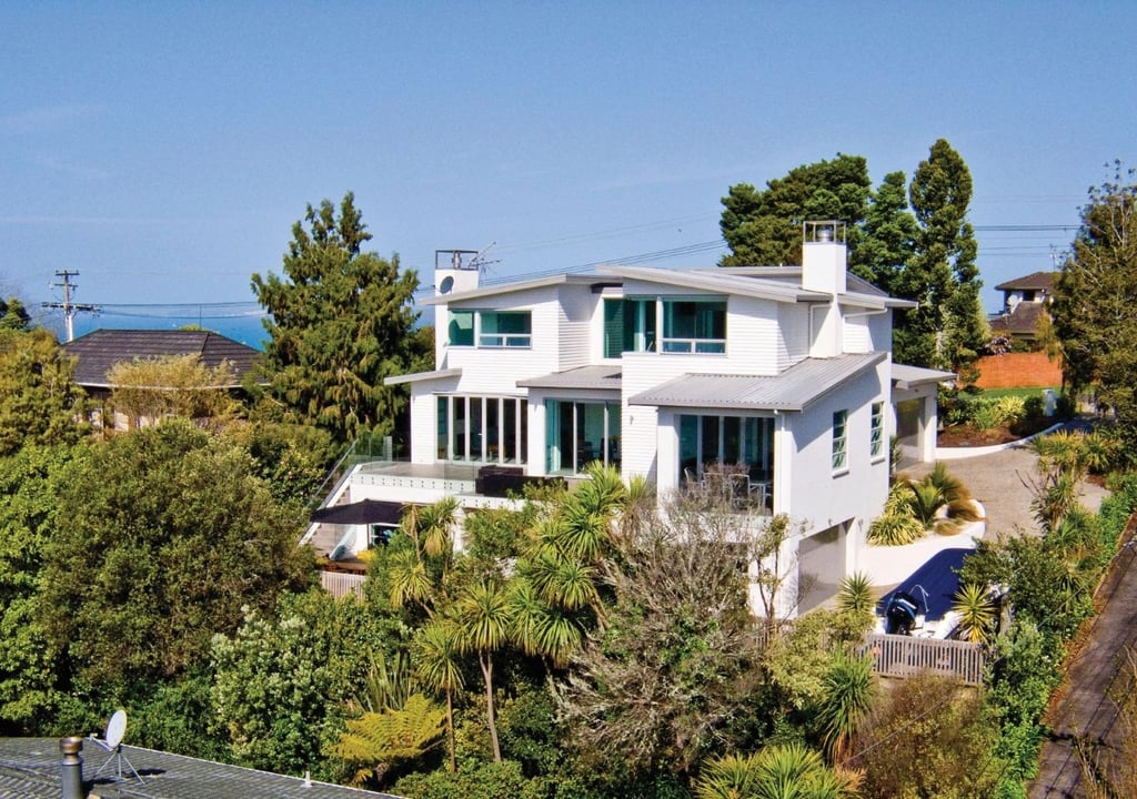 new mono pitched three storey weatherboard home, house removed