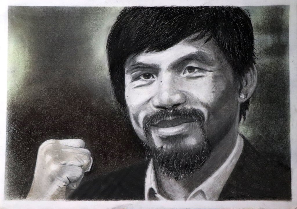 Retrato de Manny Pacquiao a mano, elaborado con carboncillo, gises y pastel en papel fabriano