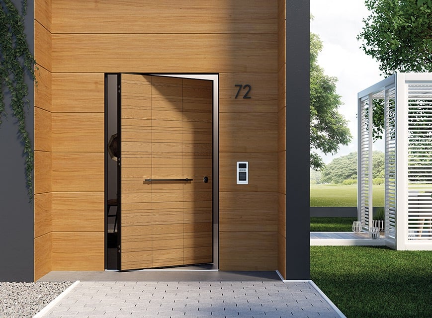 a modern wooden door with a wooden door and a door with a number seventy on