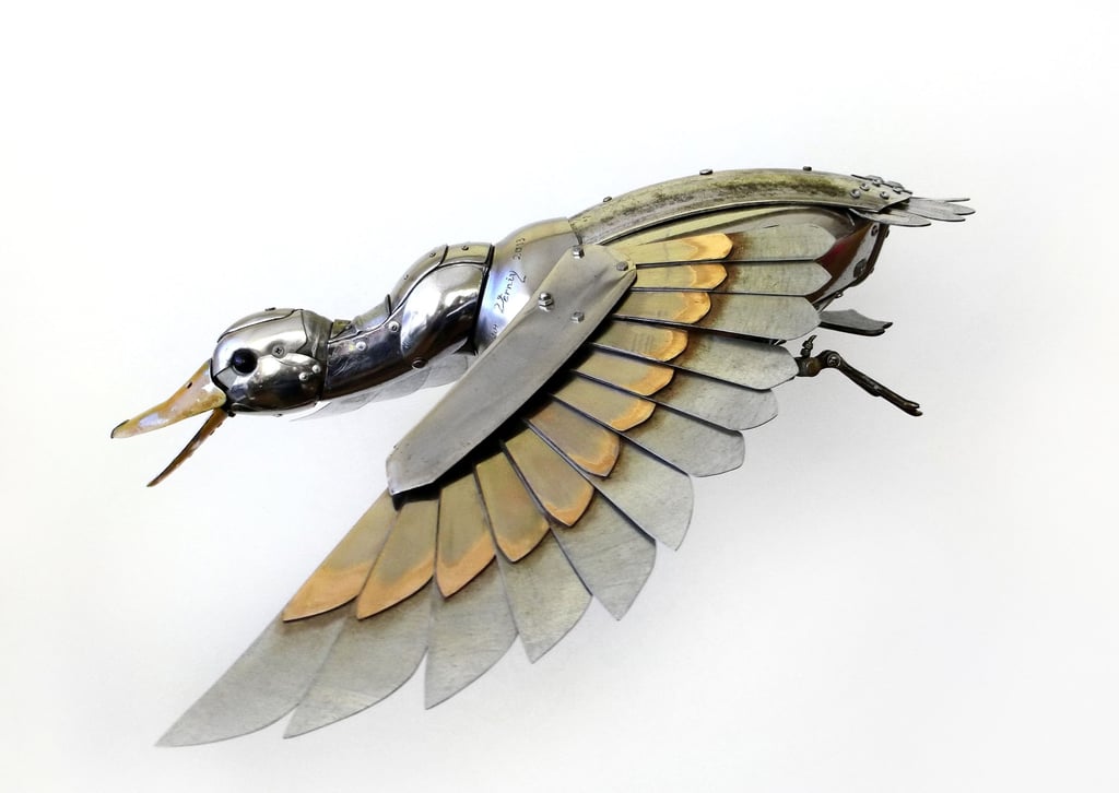 Igor Verny brass and silver steampunk flying bird, small metal sculpture