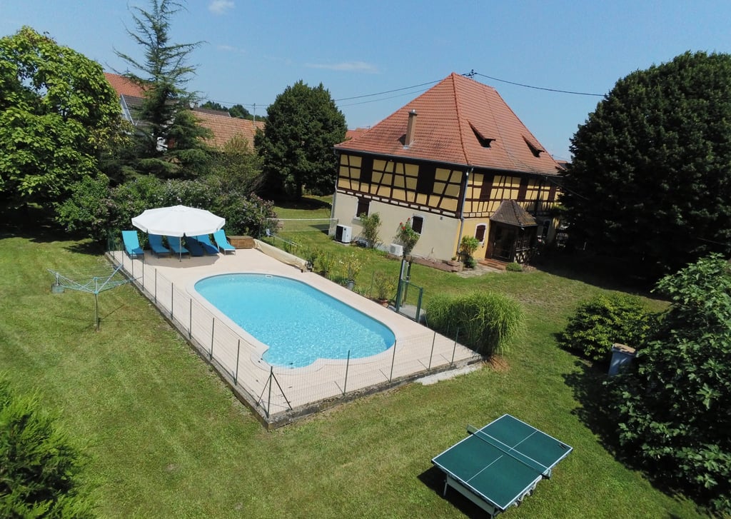 a pool with a table tennis