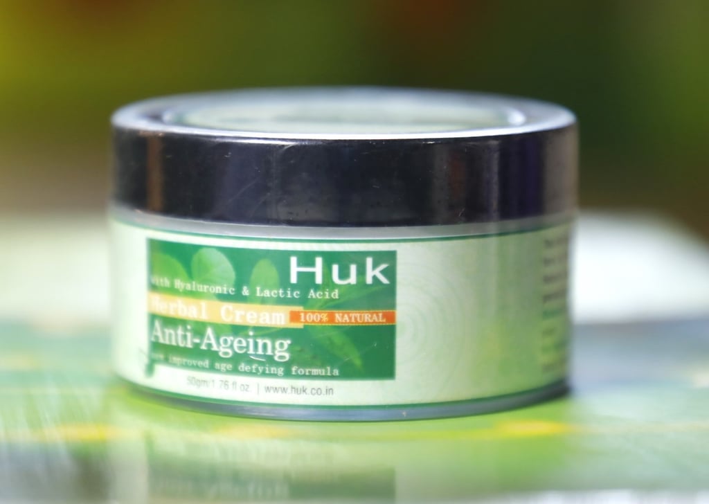 Huk herbal anti-ageing face cream jar with hyaluronic and lactic acid for skincare.