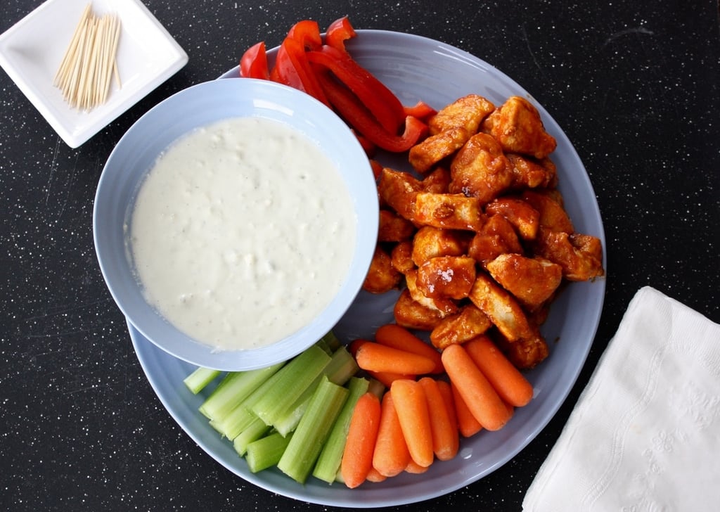 buffalo chicken bites with blue cheese dip and vegetables