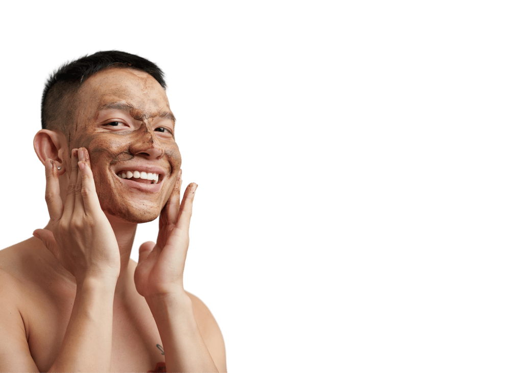 young male using cafines all natural face scrub