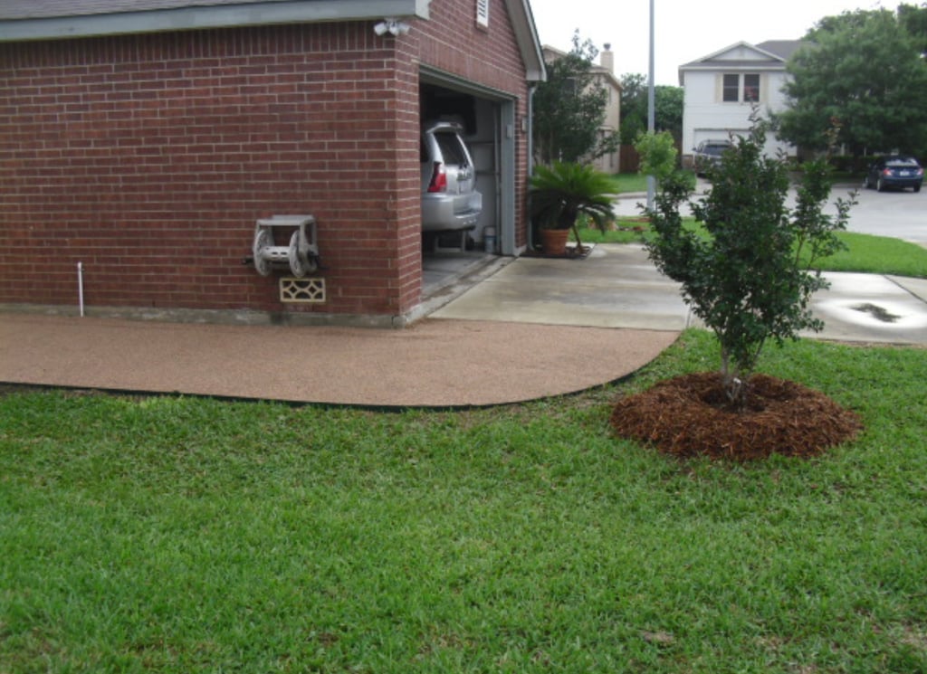 decomposed granite walkway alongside house 